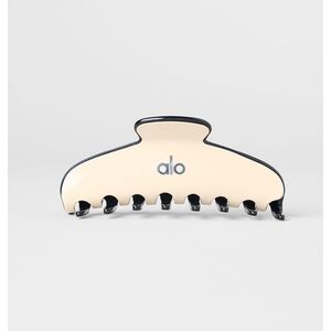ALO Yoga Cream and Black Hair Clip